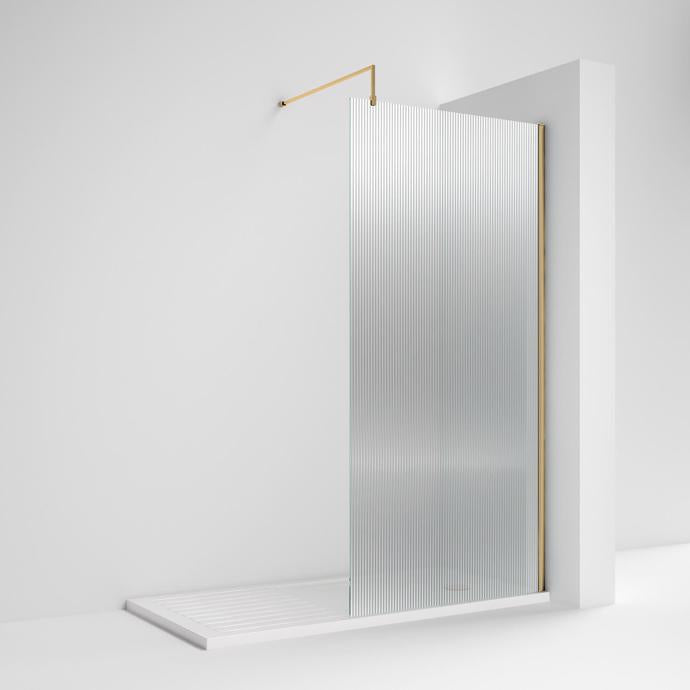 Shower enclosure with a gold handle 