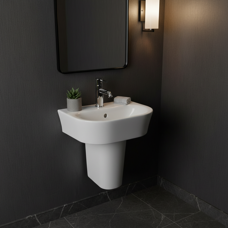 Rectangular basin with semi-pedestal styled in a luxury cloakroom setting