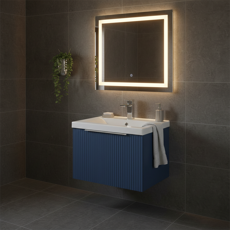 Hudson Reed satin blue ribbed fluted wall-hung single drawer vanity unit with integrated white ceramic basin and chrome tap styled in a dark contemporary designer bathroom