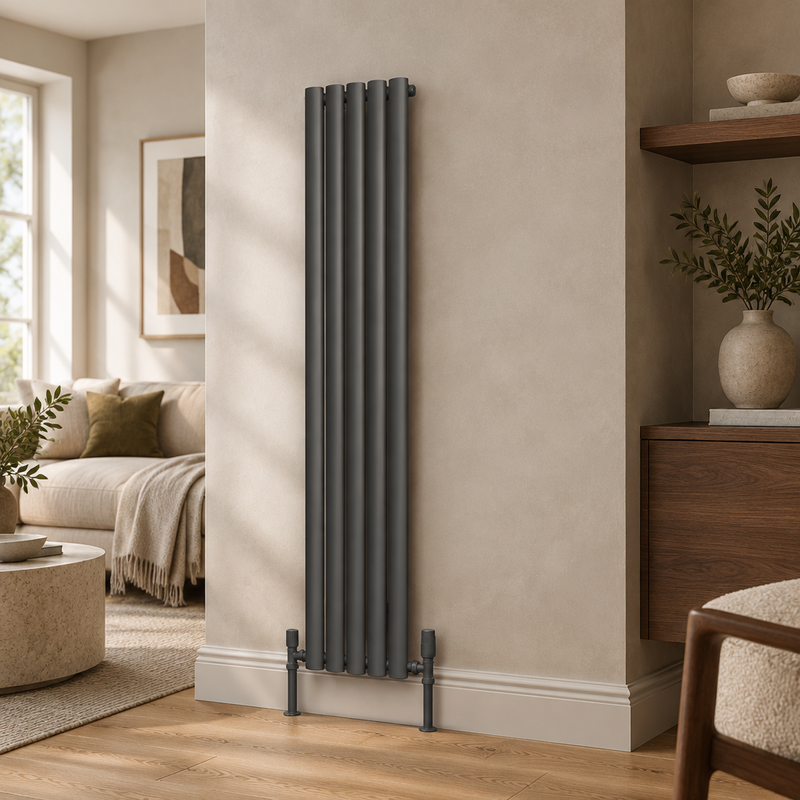 Dark grey vertical radiator in a refined neutral designer interior